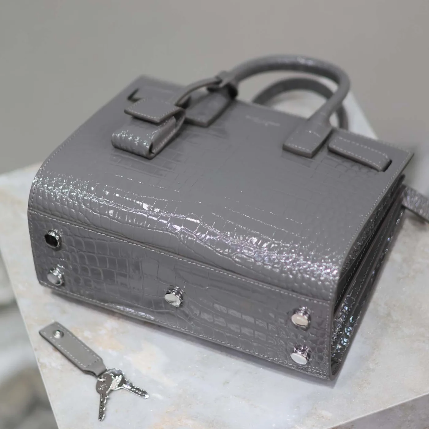 Saint Laurent YSL Sac De Jour in Crocodile Embossed Leather Nano for Women in Silver Saint Laurent YSL Sac De Jour in Crocodile Embossed Leather Nano for Women in Silver