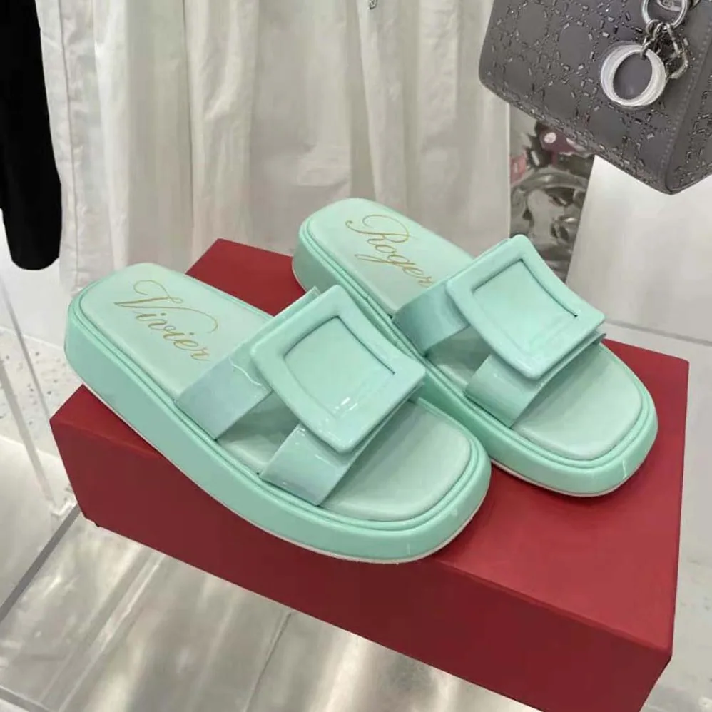 Roger Vivier Vivier Slide Covered Buckle Mules in Patent Leather for Women in Aqua Roger Vivier Vivier Slide Covered Buckle Mules in Patent Leather for Women in Aqua