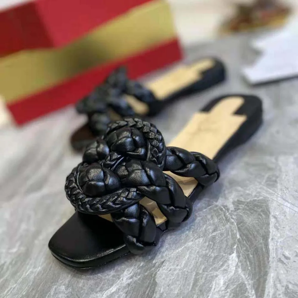 Christian Louboutin Marmela Flat Mule is Modern and Elegant for Women in Black