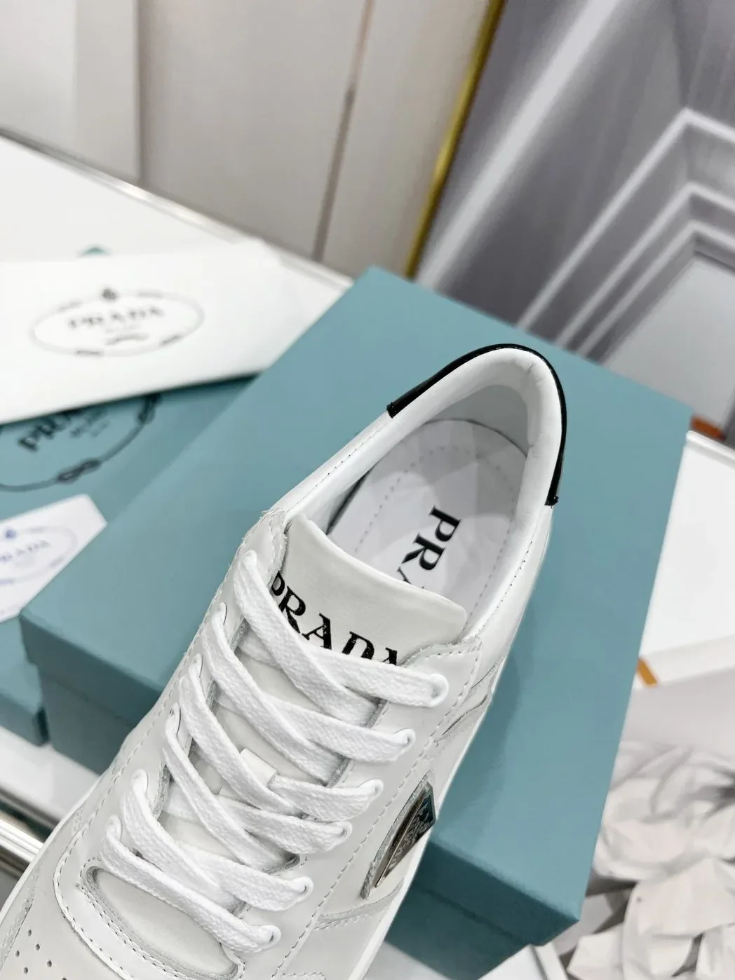 Prada Downtown Perforated Sneakers White in Black /