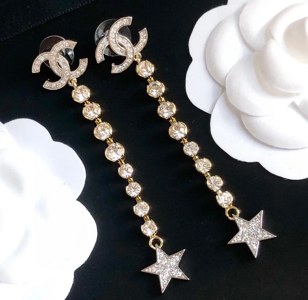 Chanel Long Star Earrings Gold Chanel Long Star Earrings Gold