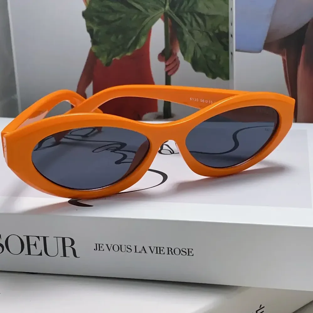 Prada Symbole Sunglasses for Unisex in Orange