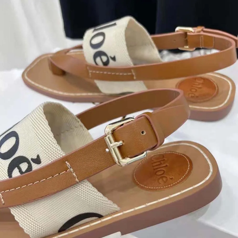 Chloe Woody Flat Sandal in Calfskin and Canvas for Women in White Chloe Woody Flat Sandal in Calfskin and Canvas for Women in White
