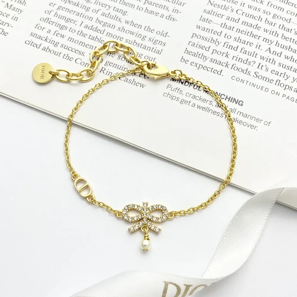 Dior Le Nœud de Dior Necklace Gold-Finish Metal with White Resin Pearl and Silver for Women in Tone Crystals Dior Le Nœud de Dior Necklace Gold-Finish Metal with White Resin Pearl and Silver for Women in Tone Crystals