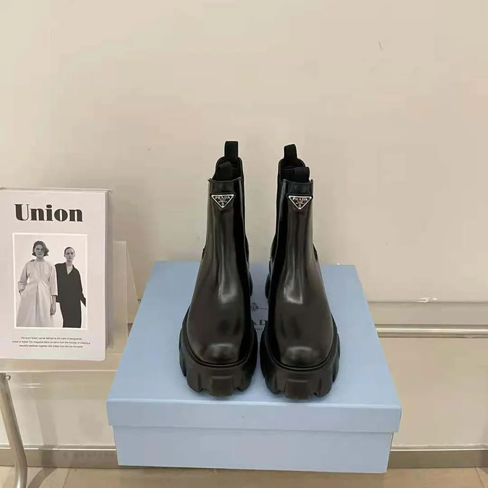 Prada Monolith Brushed Leather Booties for Women in Black