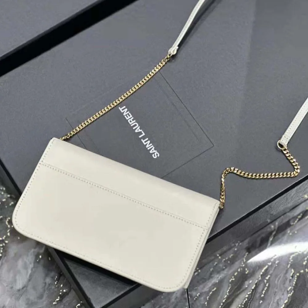 Saint Laurent YSL Cassandre Phone Holder with Strap in Smooth Leather for Women in White Saint Laurent YSL Cassandre Phone Holder with Strap in Smooth Leather for Women in White