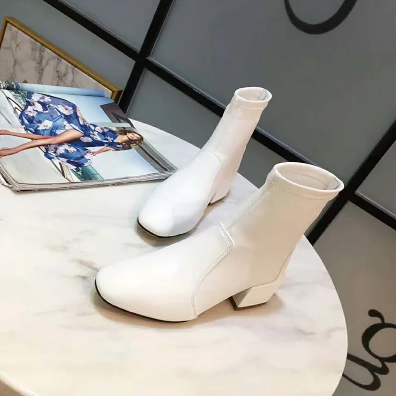 Stuart Weitzman Shoes The Accordion Bootie 40mm Heel for Women in White Stuart Weitzman Shoes The Accordion Bootie 40mm Heel for Women in White