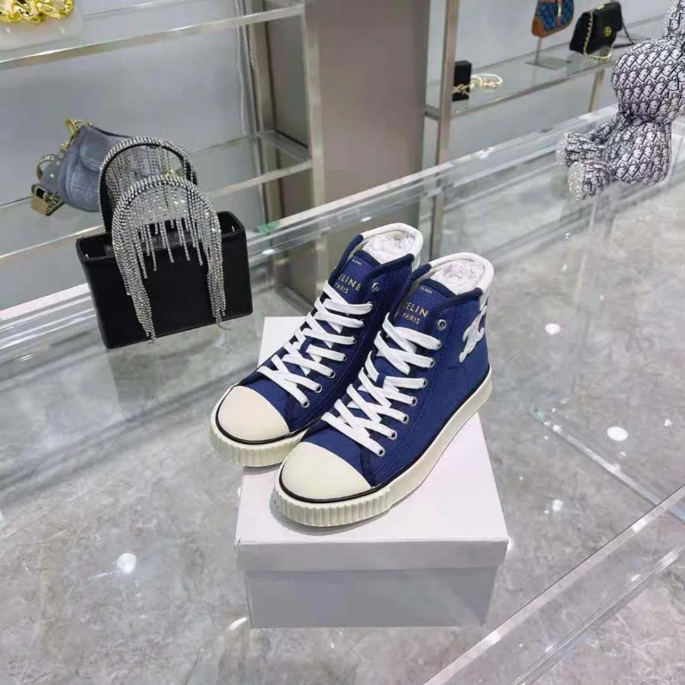 Celine Blank Mid Lace up Sneaker with Toe Cap in Canvas and Calfskin for Women Celine Blank Mid Lace up Sneaker with Toe Cap in Canvas and Calfskin for Women