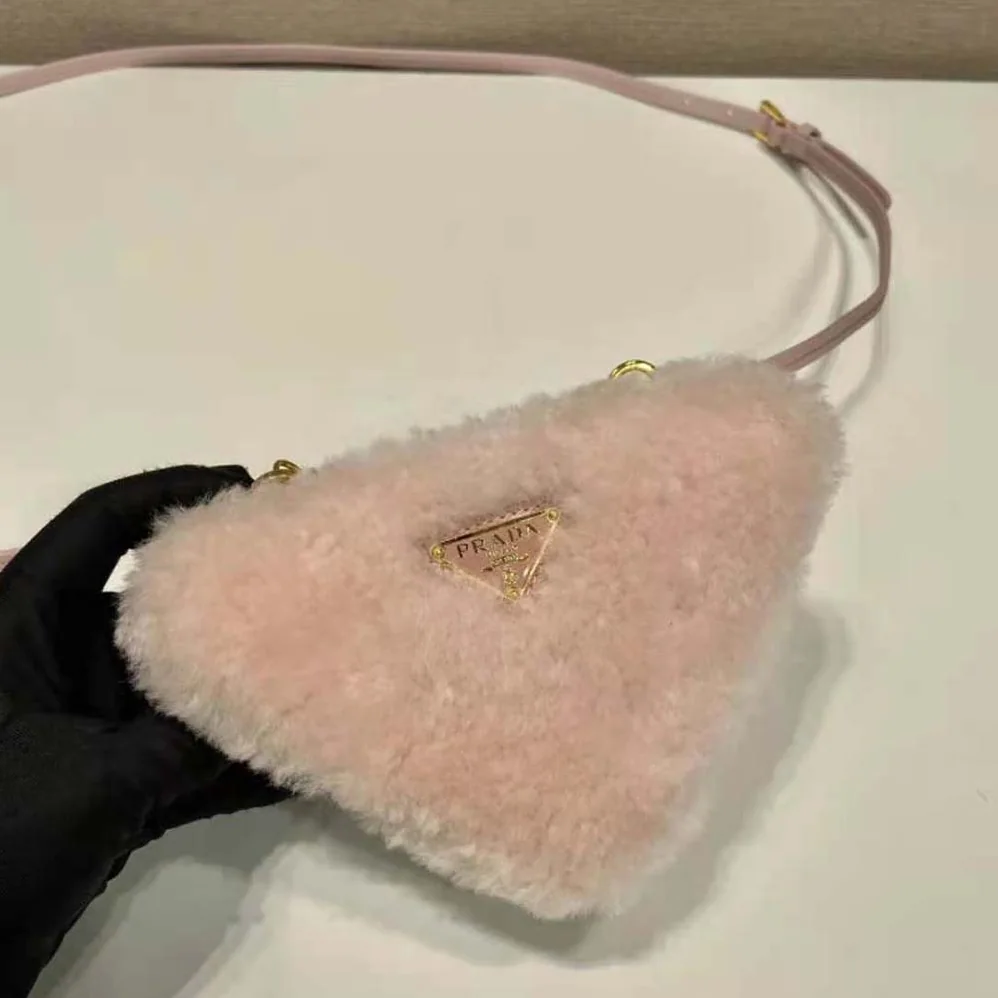 Prada Shearling and Saffiano Leather Mini-Pouch for Women in Pink Prada Shearling and Saffiano Leather Mini-Pouch for Women in Pink