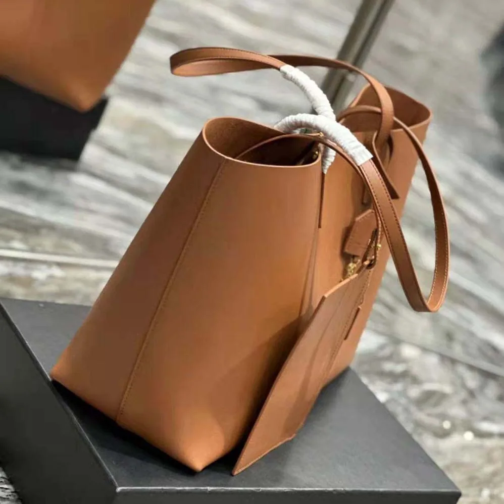 Saint Laurent YSL Shopping Saint Laurent E/W in Supple Leather for Women in Brown