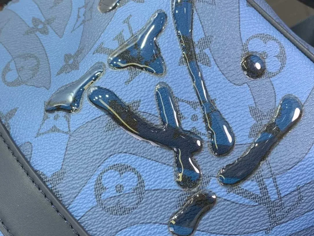 Louis Vuitton Keepall Bandouliere 35 Travel Bag in Blue Silver Hardware