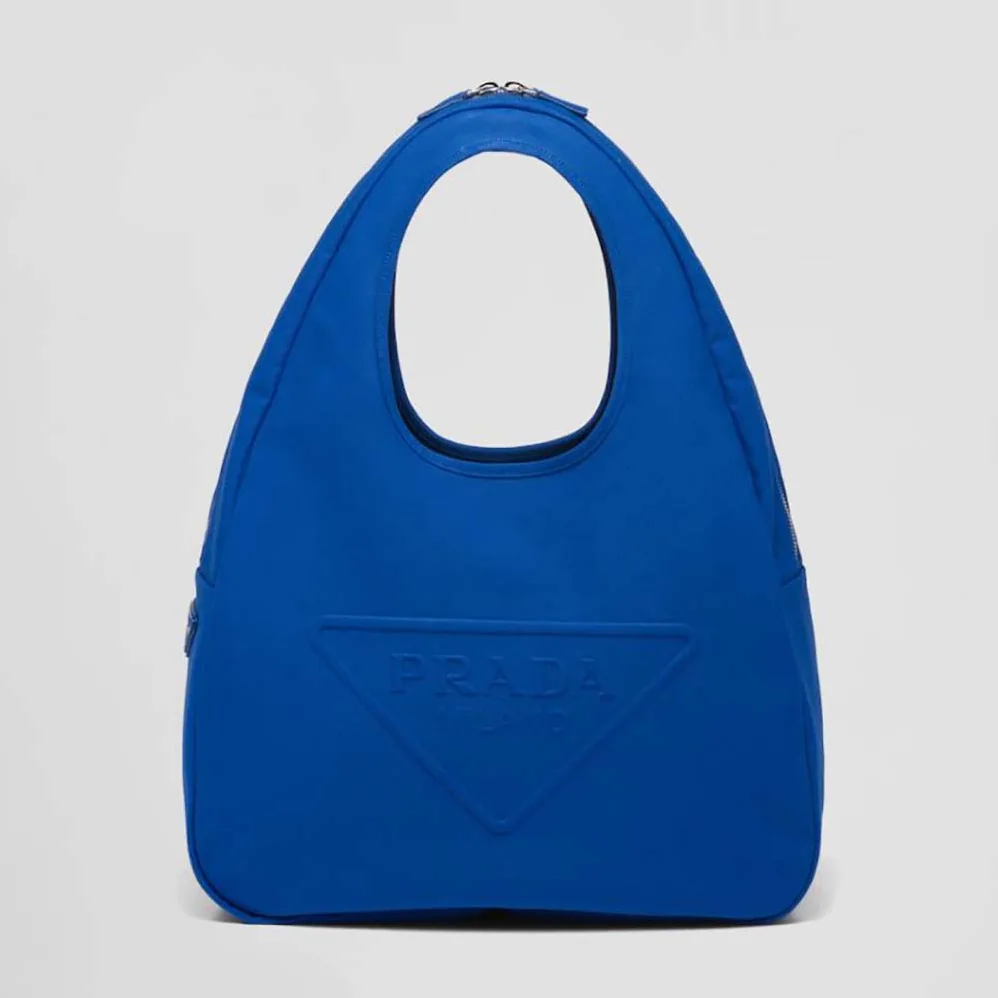 Prada Canvas Hobo Bag with Embossed Logo on the Front for Men in Blue Prada Canvas Hobo Bag with Embossed Logo on the Front for Men in Blue