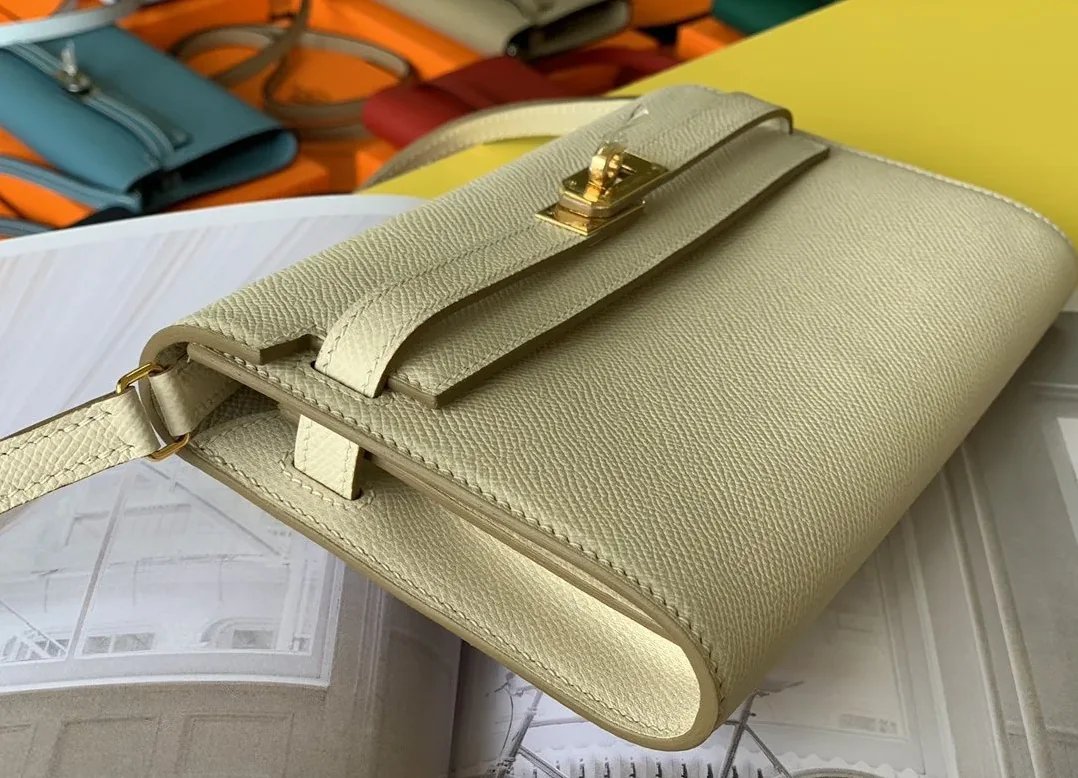 Hermes Kelly Classique To Go Wallet in Gold Toned Hardware Cream