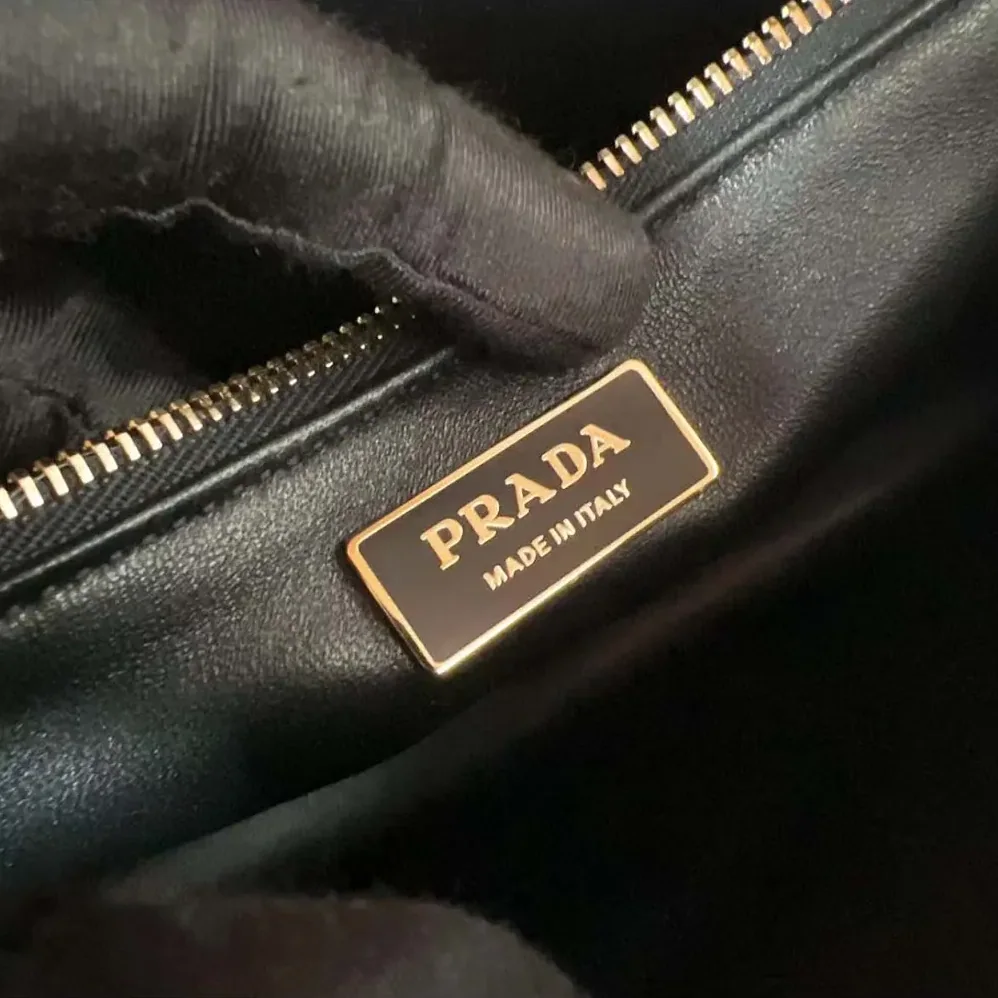 Prada Soft Sound Large Leather Shoulder Bag with Charms for Women in Brown