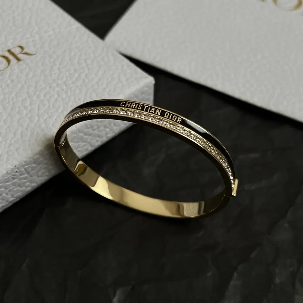 Dior Night Code Bangle Gold-Finish Metal White Crystals and Black Lacquer for Women Dior Night Code Bangle Gold-Finish Metal White Crystals and Black Lacquer for Women