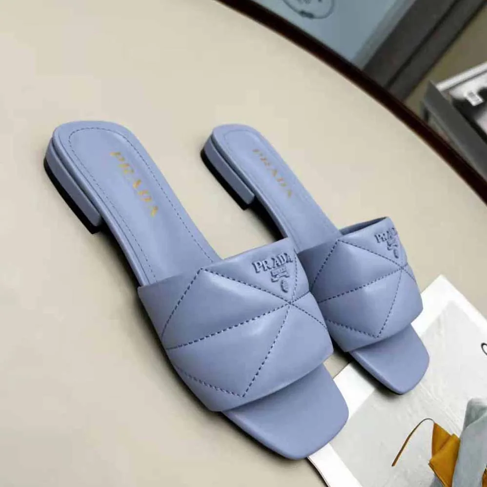 Prada Quilted Nappa Leather Sabots for Women in Blue