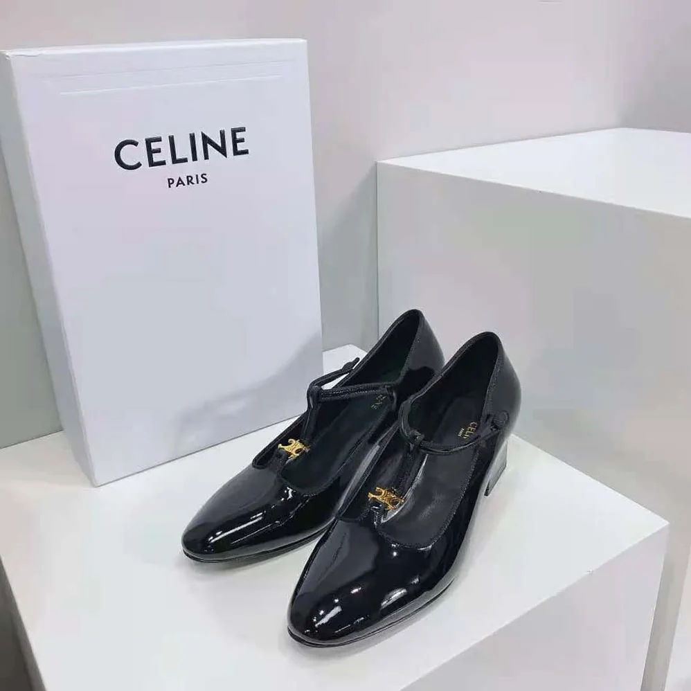 Celine Babies T-Bar Pump in Patent Calfskin and Grosgrain for Women in Black Celine Babies T-Bar Pump in Patent Calfskin and Grosgrain for Women in Black