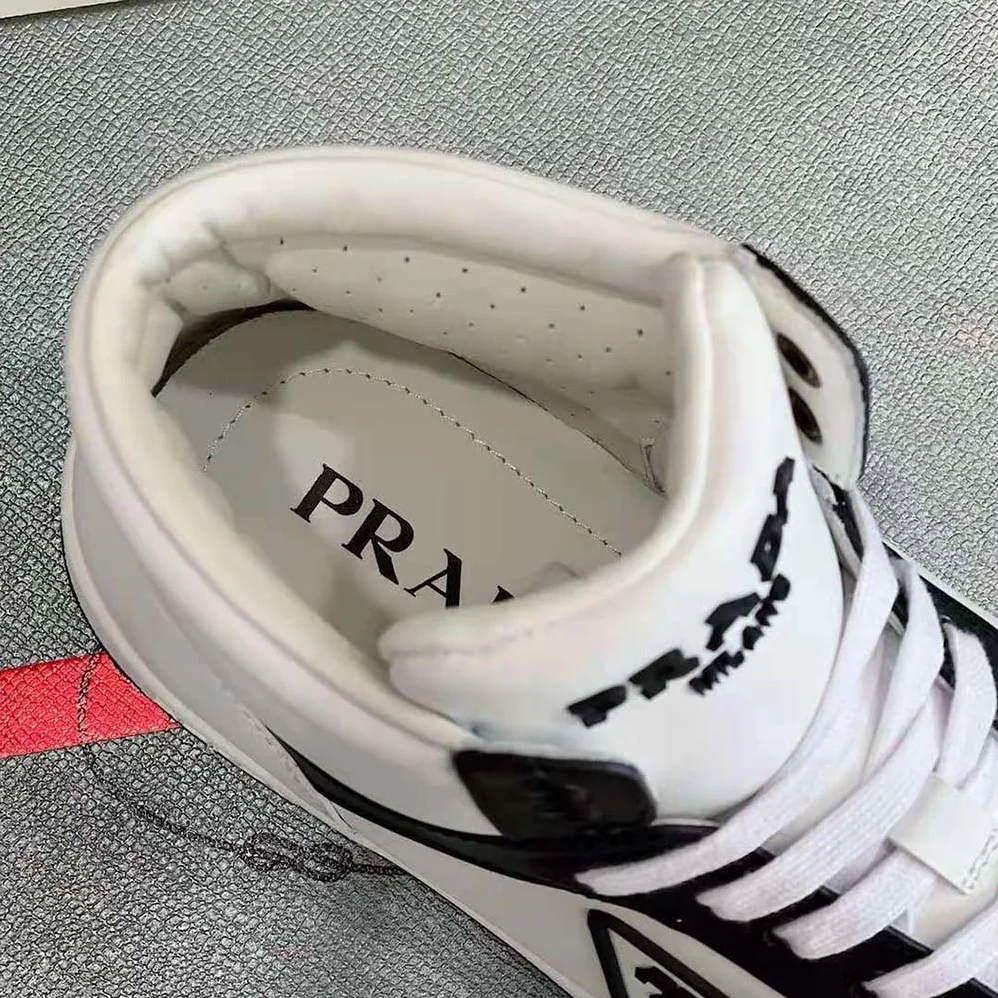Prada Sporty Leather High-Top Sneakers for Men in Black