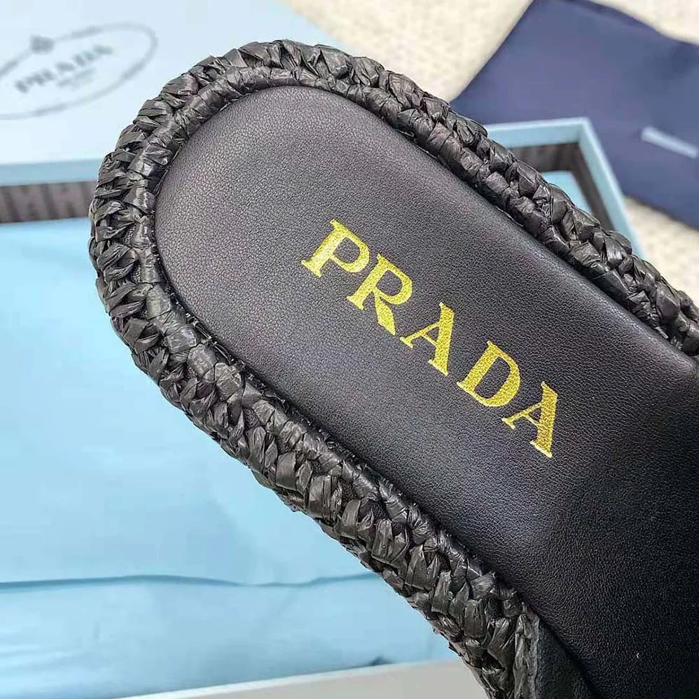 Prada Crochet Flatform Slides with Enameled Metal Triangle Logo for Women in Black Prada Crochet Flatform Slides with Enameled Metal Triangle Logo for Women in Black