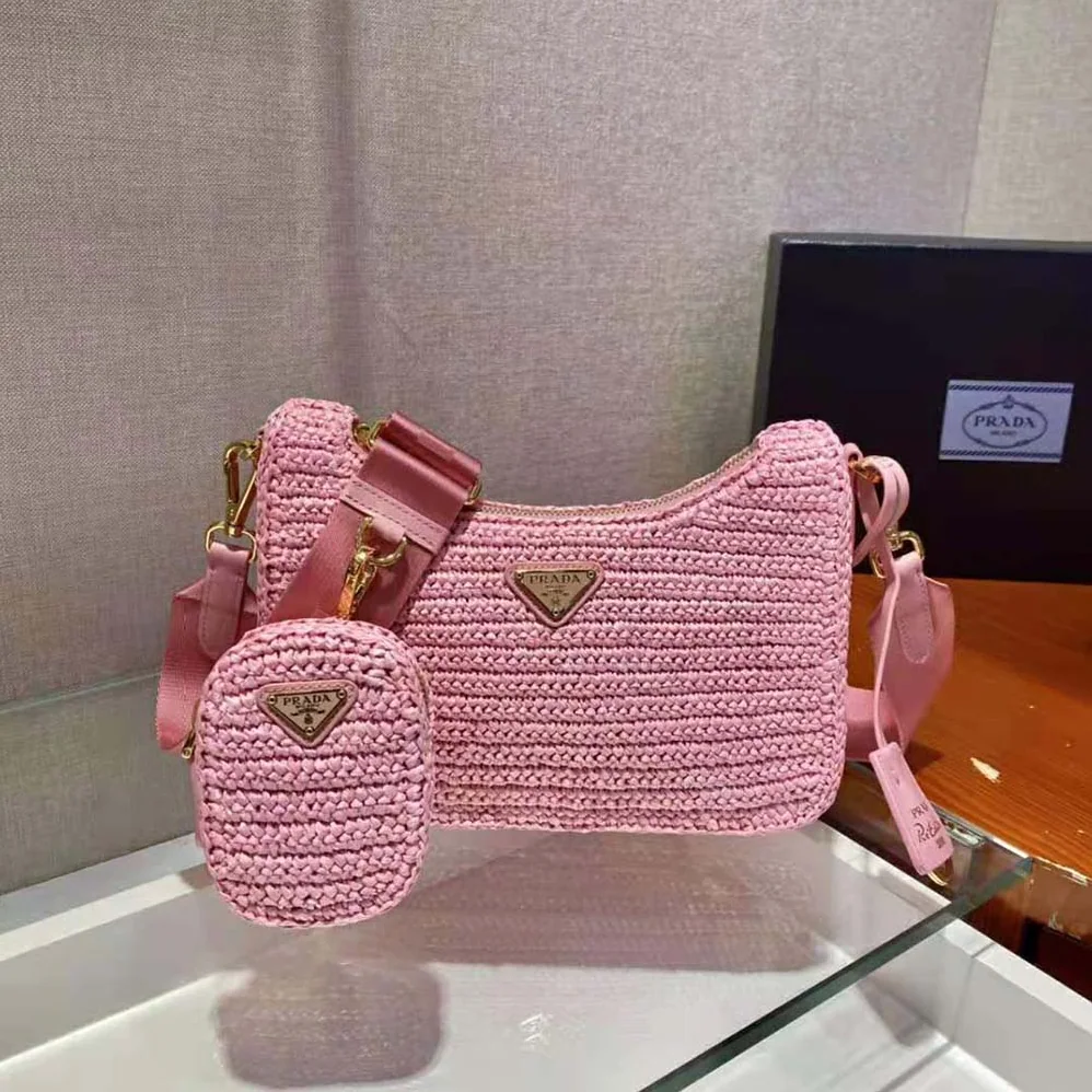 Prada Re-Edition 2005 Raffia Bag for Women in Pink Prada Re-Edition 2005 Raffia Bag for Women in Pink