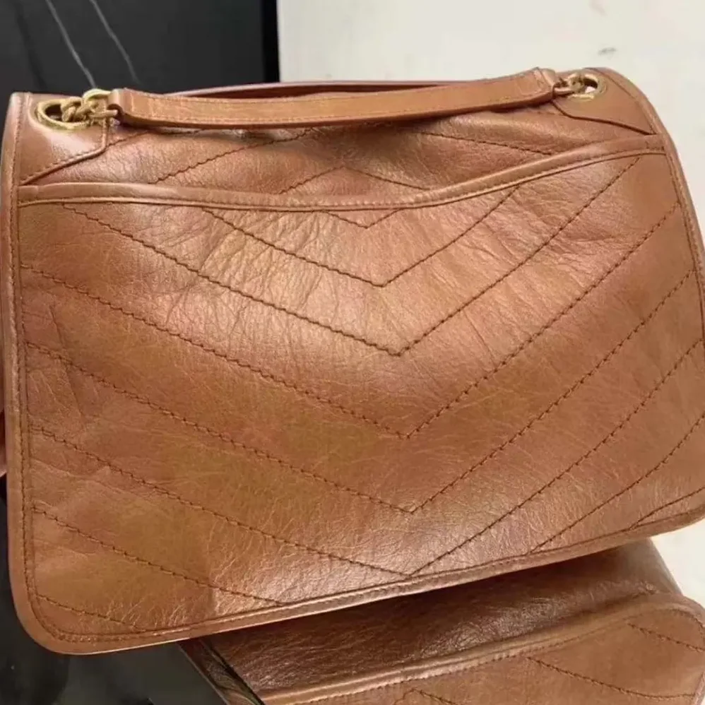 Saint Laurent YSL Niki Medium in Vintage Leather for Women Saint Laurent YSL Niki Medium in Vintage Leather for Women