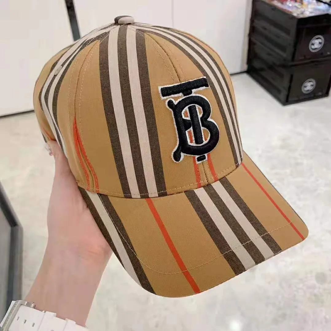 Burberry Icon Stripe Baseball Cap for Unisex in Brown Burberry Icon Stripe Baseball Cap for Unisex in Brown