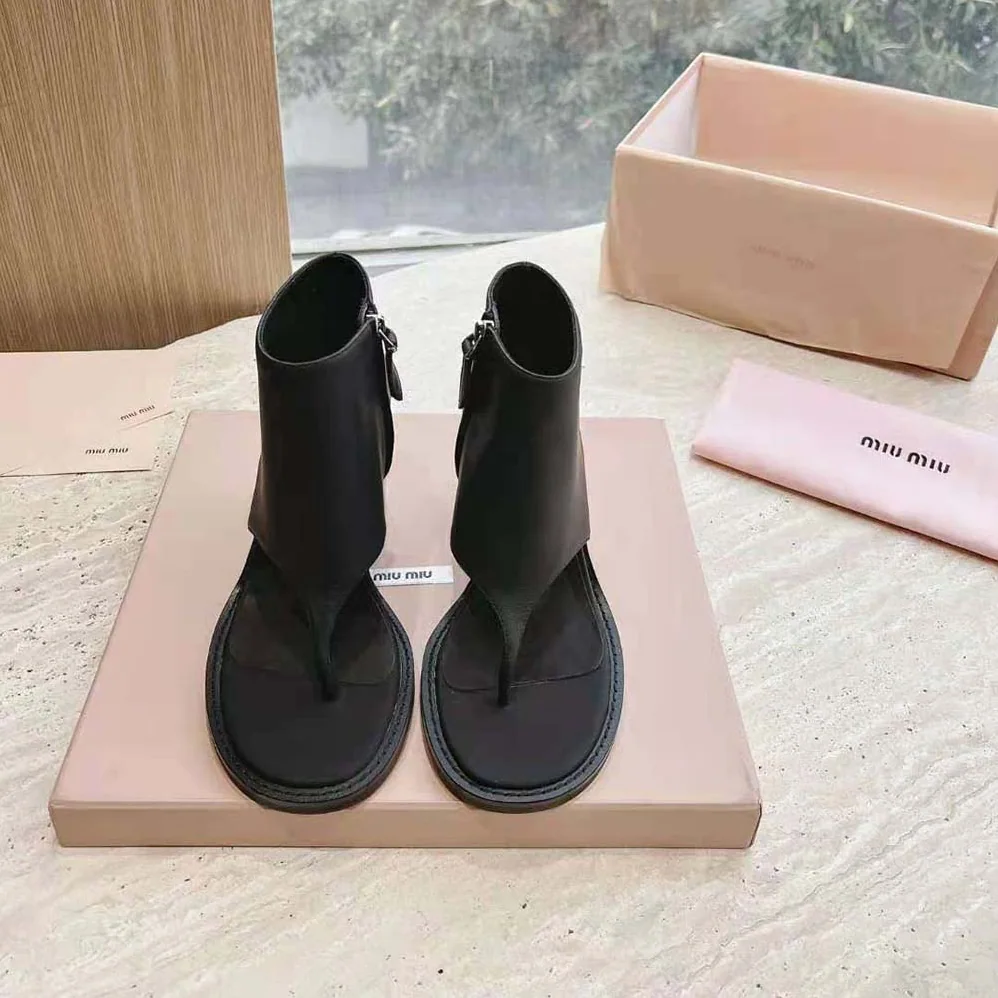 Miu Miu Leather Thong Booties for Women in Black