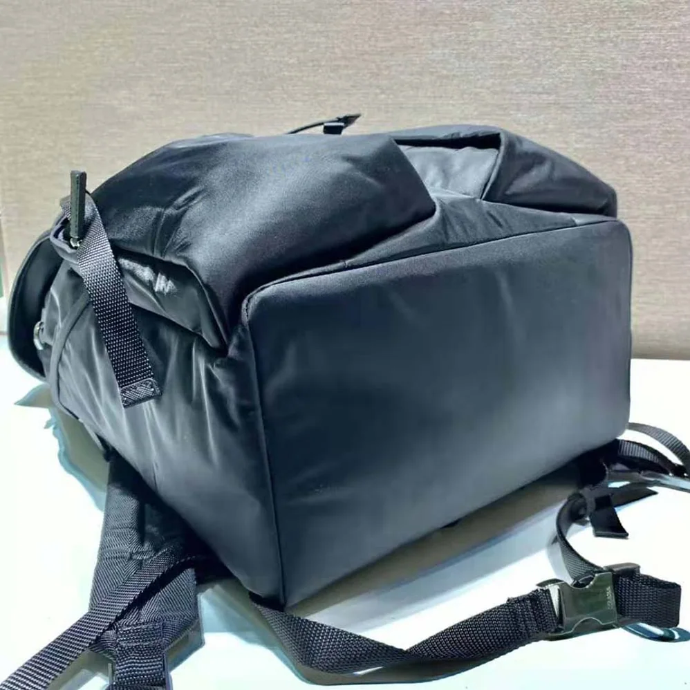 Prada Re-Nylon and Saffiano Leather Backpack with Triangle Logo for Unisex in Black
