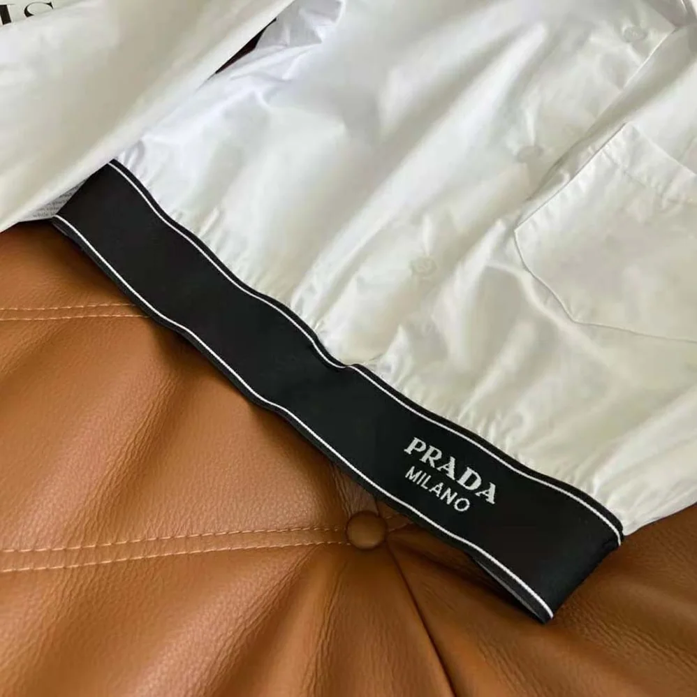 Prada Stretch Poplin Shirt with a Hybrid Design Reinvents for Women Prada Stretch Poplin Shirt with a Hybrid Design Reinvents for Women