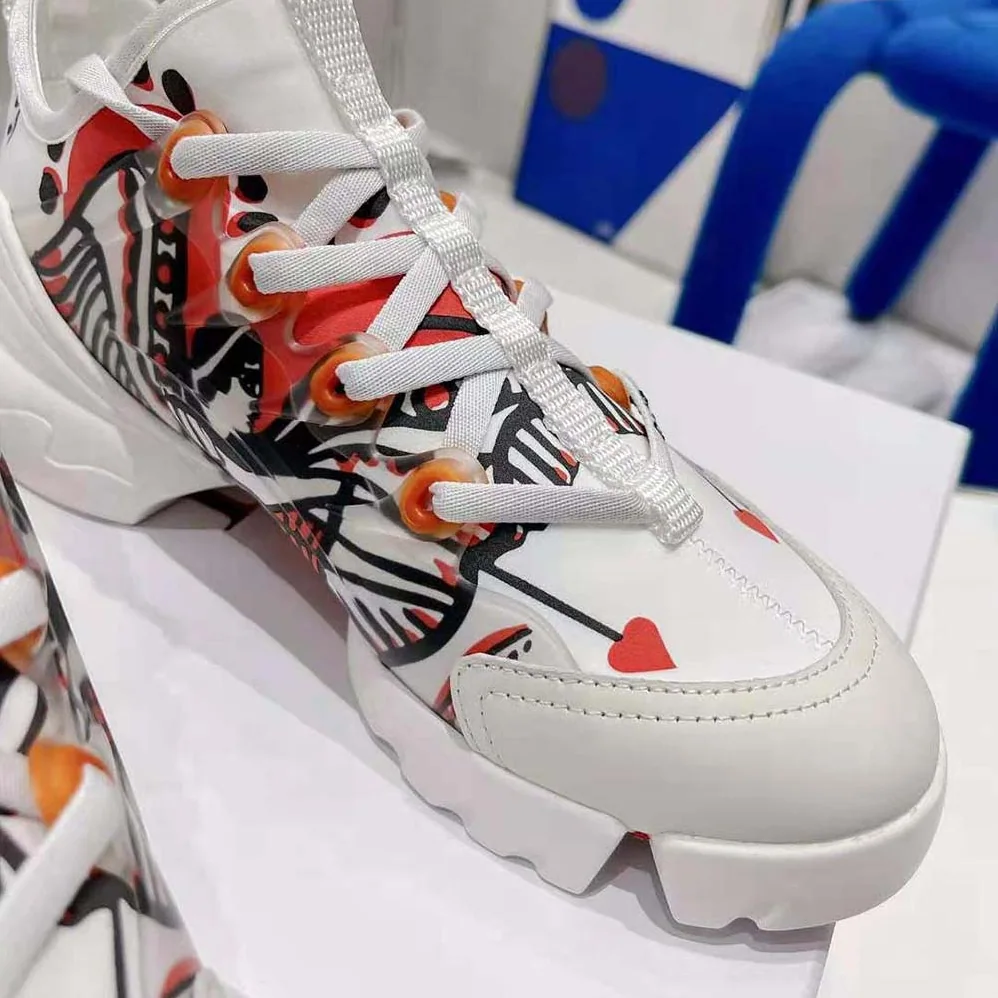 Dior D-Connect Sneaker White Technical Fabric with Red and Black Cupidon Print for Women Dior D-Connect Sneaker White Technical Fabric with Red and Black Cupidon Print for Women