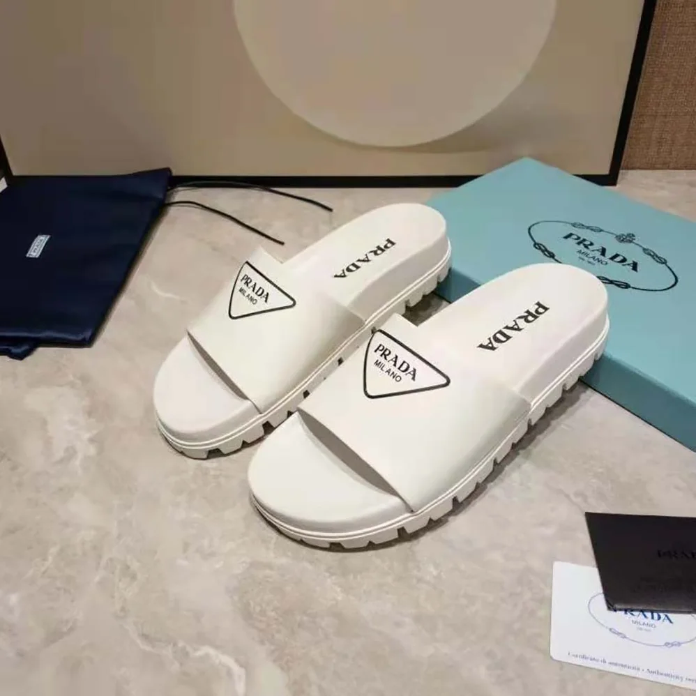 Prada Leather Slides in 20mm Heel for Women in White Prada Leather Slides in 20mm Heel for Women in White