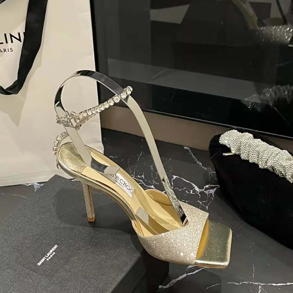 Jimmy Choo Saeda Sandal 100 Platinum Ice Dusty Glitter Sandals with Crystal Embellishment for Women Jimmy Choo Saeda Sandal 100 Platinum Ice Dusty Glitter Sandals with Crystal Embellishment for Women