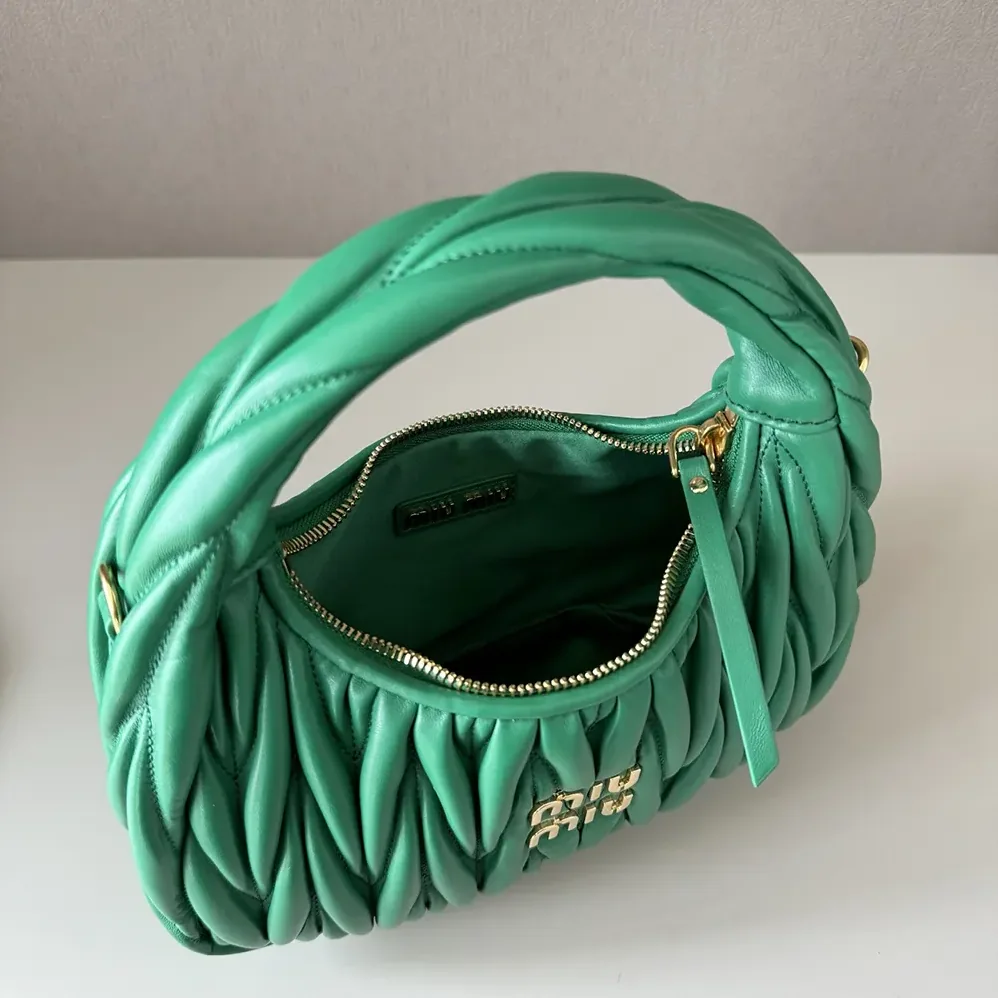 Miu Miu Wander Matelassé Nappa Leather Hobo Bag for Women in Green Miu Miu Wander Matelassé Nappa Leather Hobo Bag for Women in Green