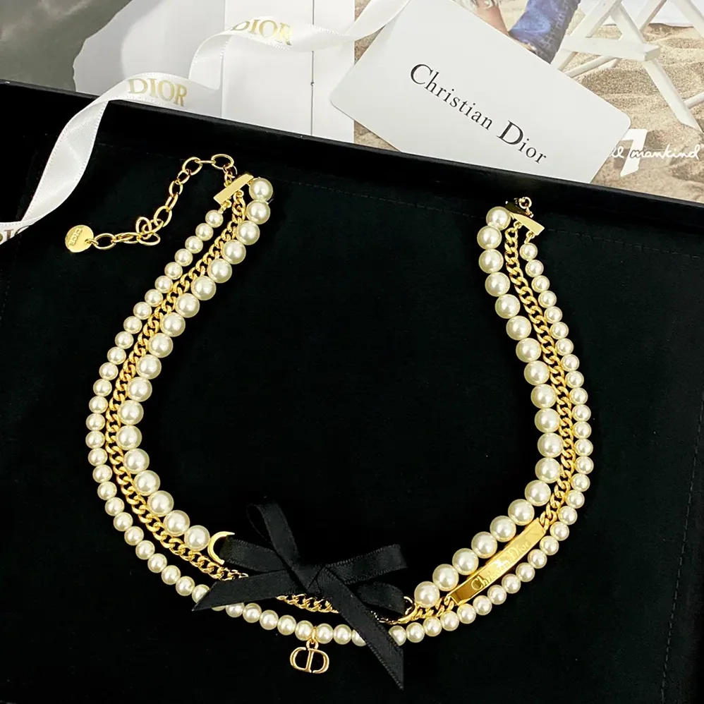 Dior Le Nœud de Dior Choker Gold-Finish Metal with White Resin Pearls and Black Satin for Women Dior Le Nœud de Dior Choker Gold-Finish Metal with White Resin Pearls and Black Satin for Women