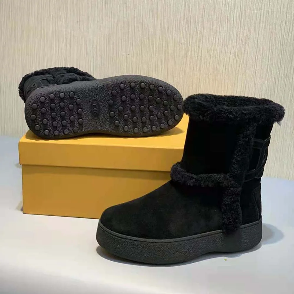 TODS Tod's W. G. Ankle Boots in Suede for Unisex in Black