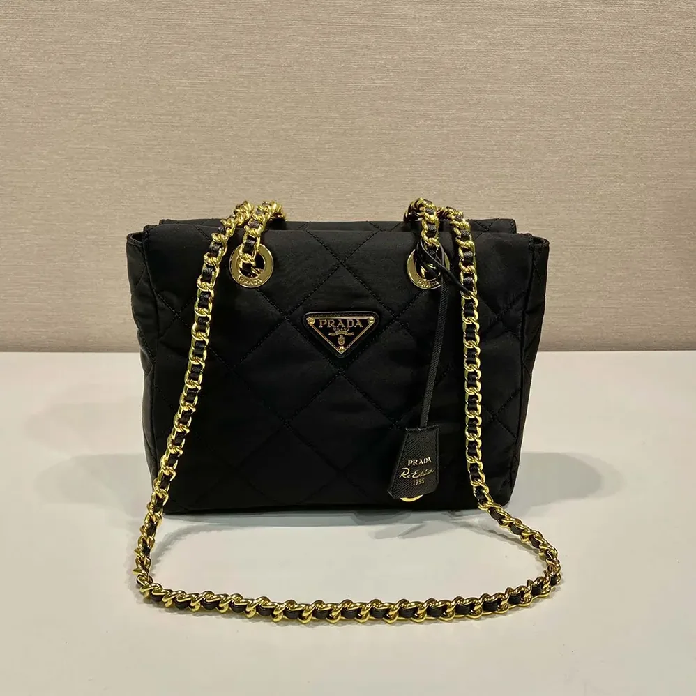 Prada Re-Edition 1995 Chaîne Re-Nylon Tote Bag for Women in Black Prada Re-Edition 1995 Chaîne Re-Nylon Tote Bag for Women in Black