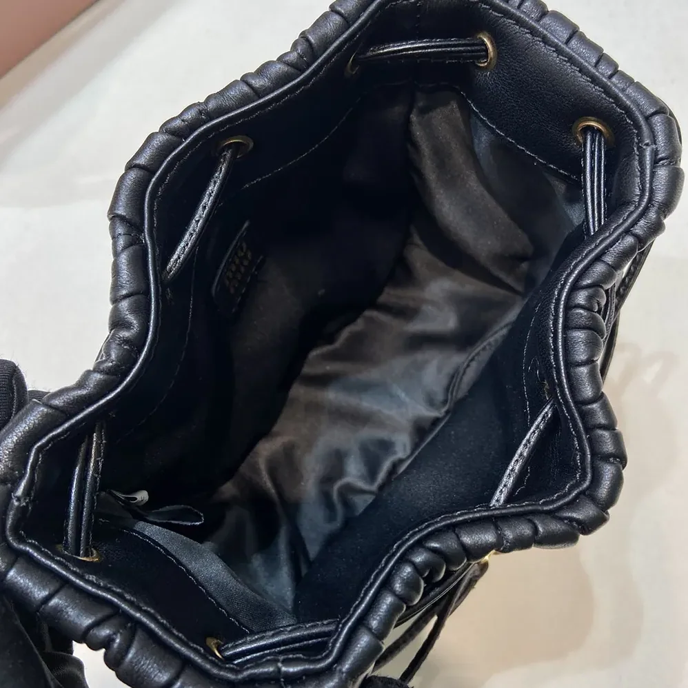 Miu Miu Matelassé Nappa Leather Pouch for Women in Black