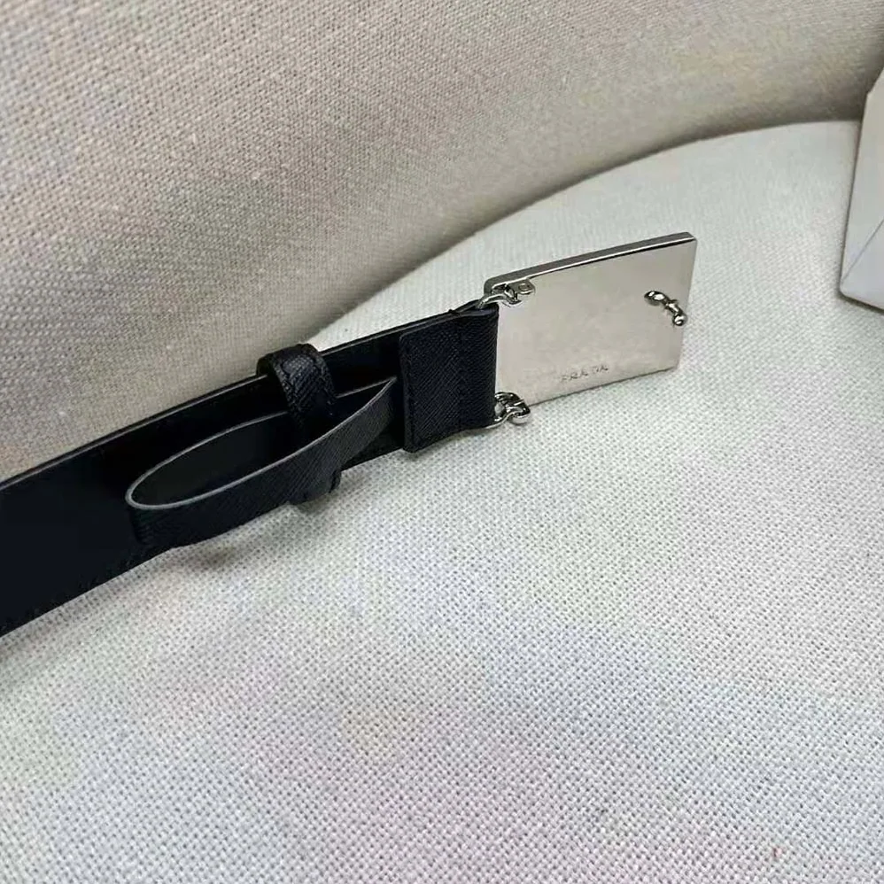 Prada Saffiano Leather Belt with Metal Lettering Logo for Men in Black Prada Saffiano Leather Belt with Metal Lettering Logo for Men in Black
