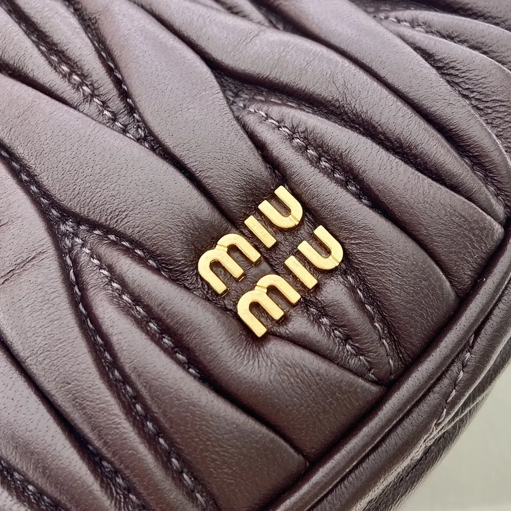 Miu Miu Matelassé Nappa Leather Pouch for Women in Burgundy Miu Miu Matelassé Nappa Leather Pouch for Women in Burgundy