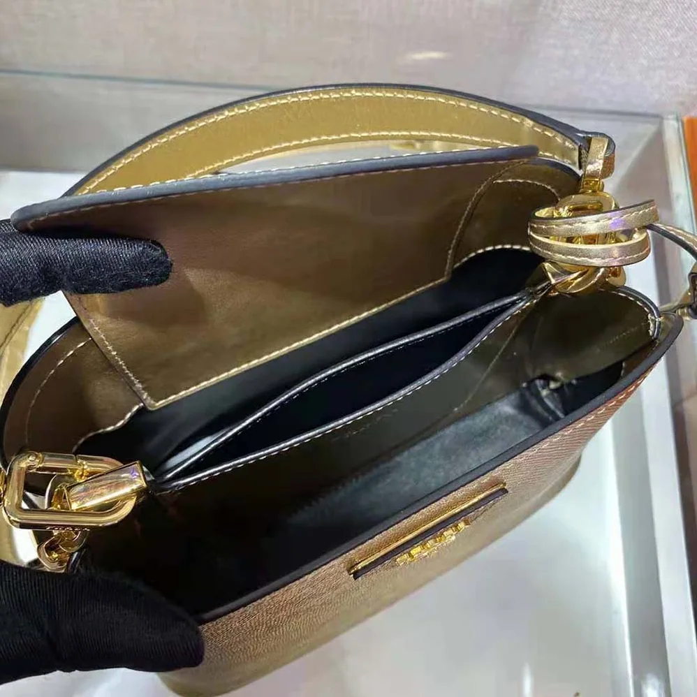 Prada Prada Matinee Micro Saffiano Leather Bag for Women in Gold Prada Prada Matinee Micro Saffiano Leather Bag for Women in Gold