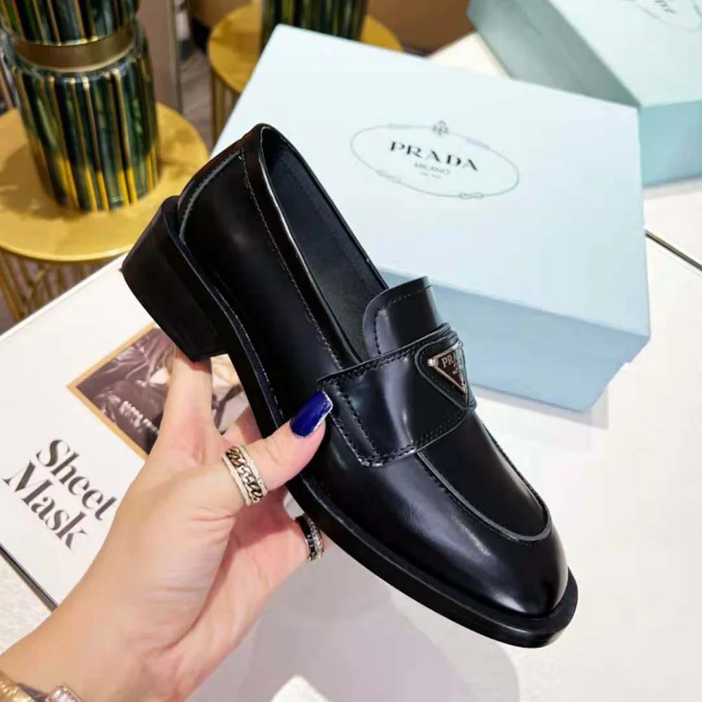 Prada Brushed Leather Loafers for Women in Black