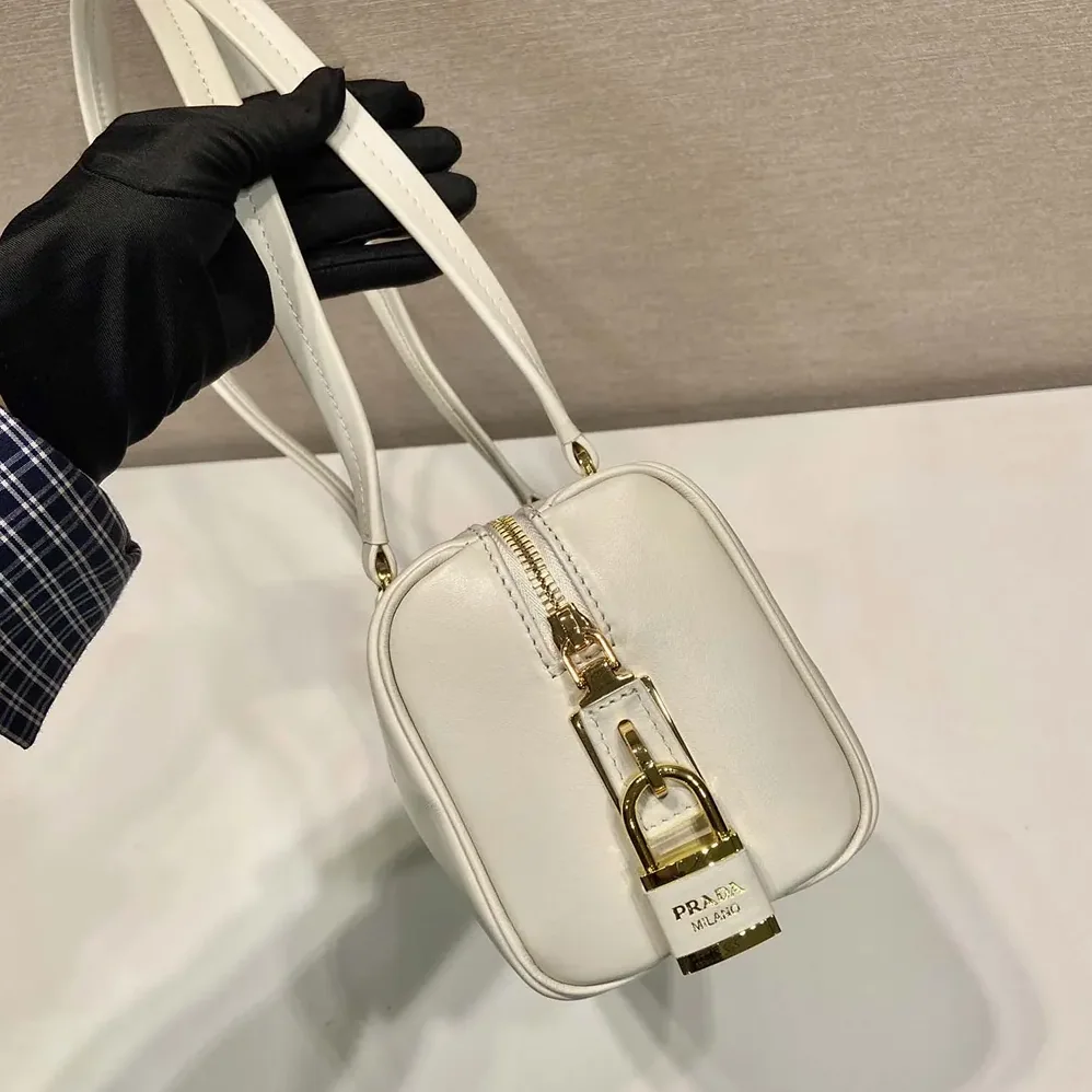 Prada Medium Leather Top-handle Bag with Padlock for Women in White Prada Medium Leather Top-handle Bag with Padlock for Women in White