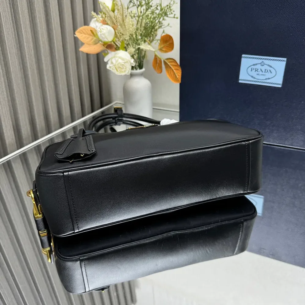 Prada Re-Nylon and Leather Small Top for Women in handle Bag with Padlock Prada Re-Nylon and Leather Small Top for Women in handle Bag with Padlock
