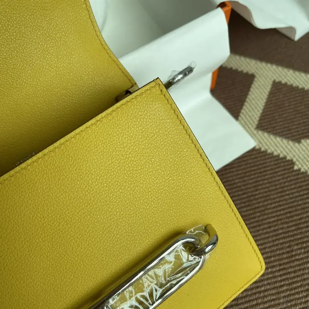 Hermes Roulis Mini Bag in Evercolor Calfskin for Women in Yellow/Gold Hermes Roulis Mini Bag in Evercolor Calfskin for Women in Yellow/Gold