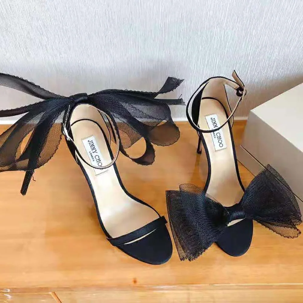 Jimmy Choo Aveline 100 Black Sandals with Asymmetric Grosgrain Mesh Fascinator Bows for Women Jimmy Choo Aveline 100 Black Sandals with Asymmetric Grosgrain Mesh Fascinator Bows for Women