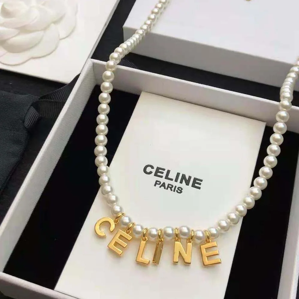 Celine Paris Pearl Bracelet in Brass with Gold Finish and Glass Pearls for Women Celine Paris Pearl Bracelet in Brass with Gold Finish and Glass Pearls for Women