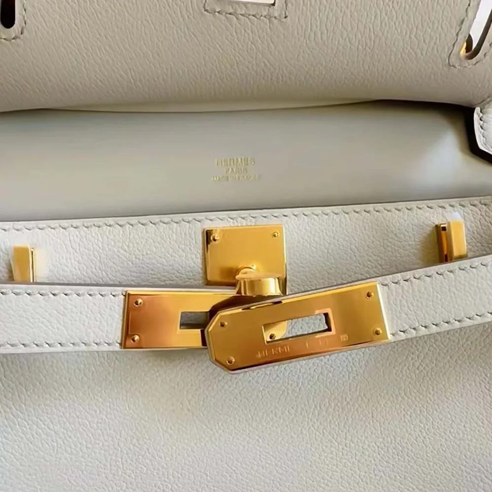 Hermes Jyspiere in Evercolor Leather for Women in White/Gold Hermes Jyspiere in Evercolor Leather for Women in White/Gold
