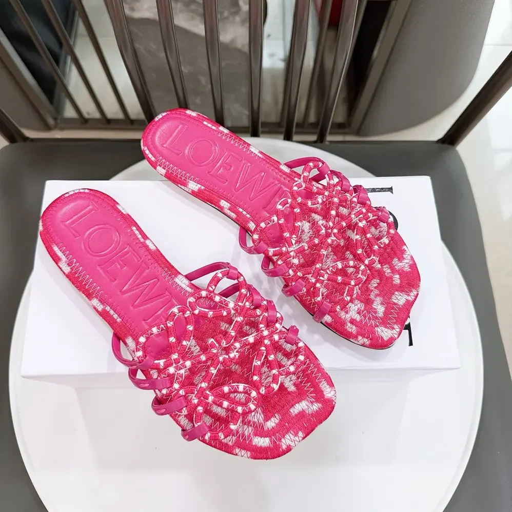 Loewe Petal Anagram Slide in Embroidered Canvas for Women in Orchid Loewe Petal Anagram Slide in Embroidered Canvas for Women in Orchid