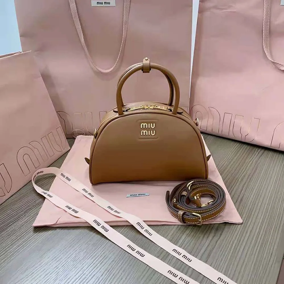 Miu Miu Medium Leather Top-handle Bag for Women in Brown