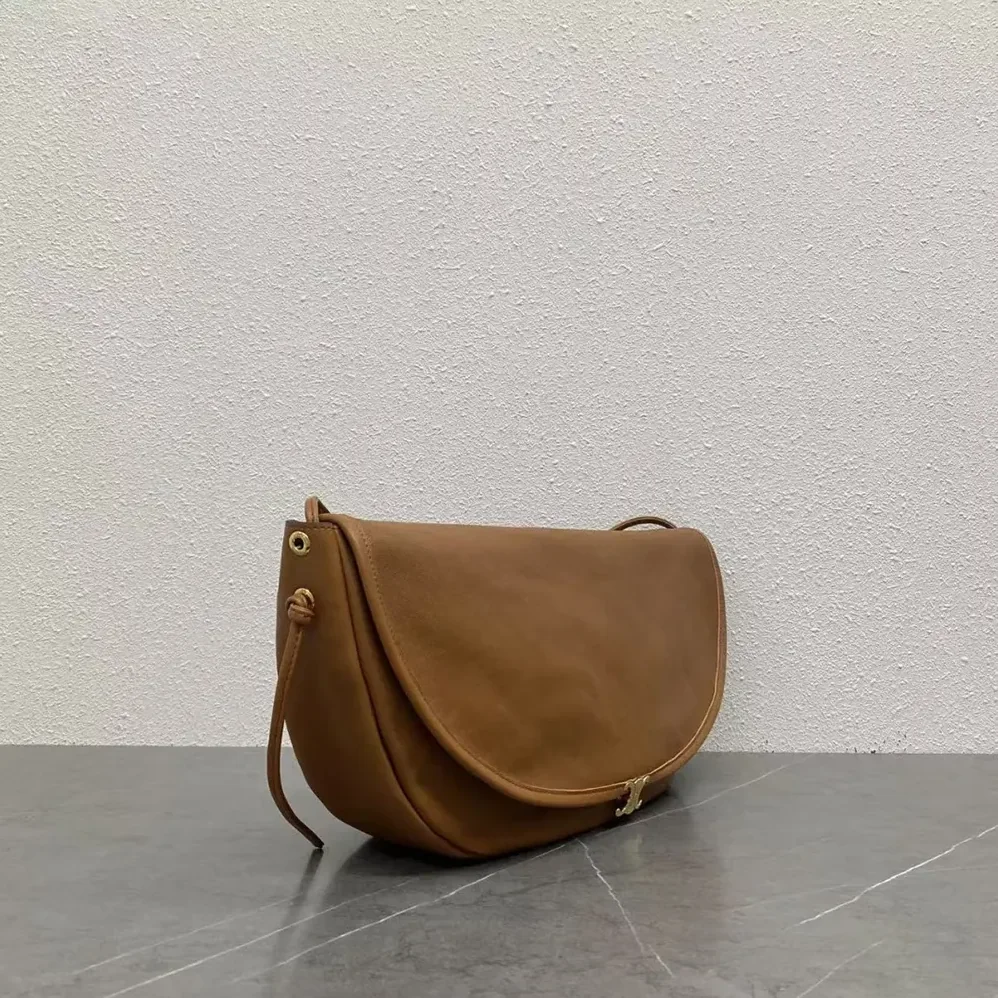 Celine Halfmoon Soft Triomphe Bag in Supple Shiny Lambskin for Women in Brown Celine Halfmoon Soft Triomphe Bag in Supple Shiny Lambskin for Women in Brown